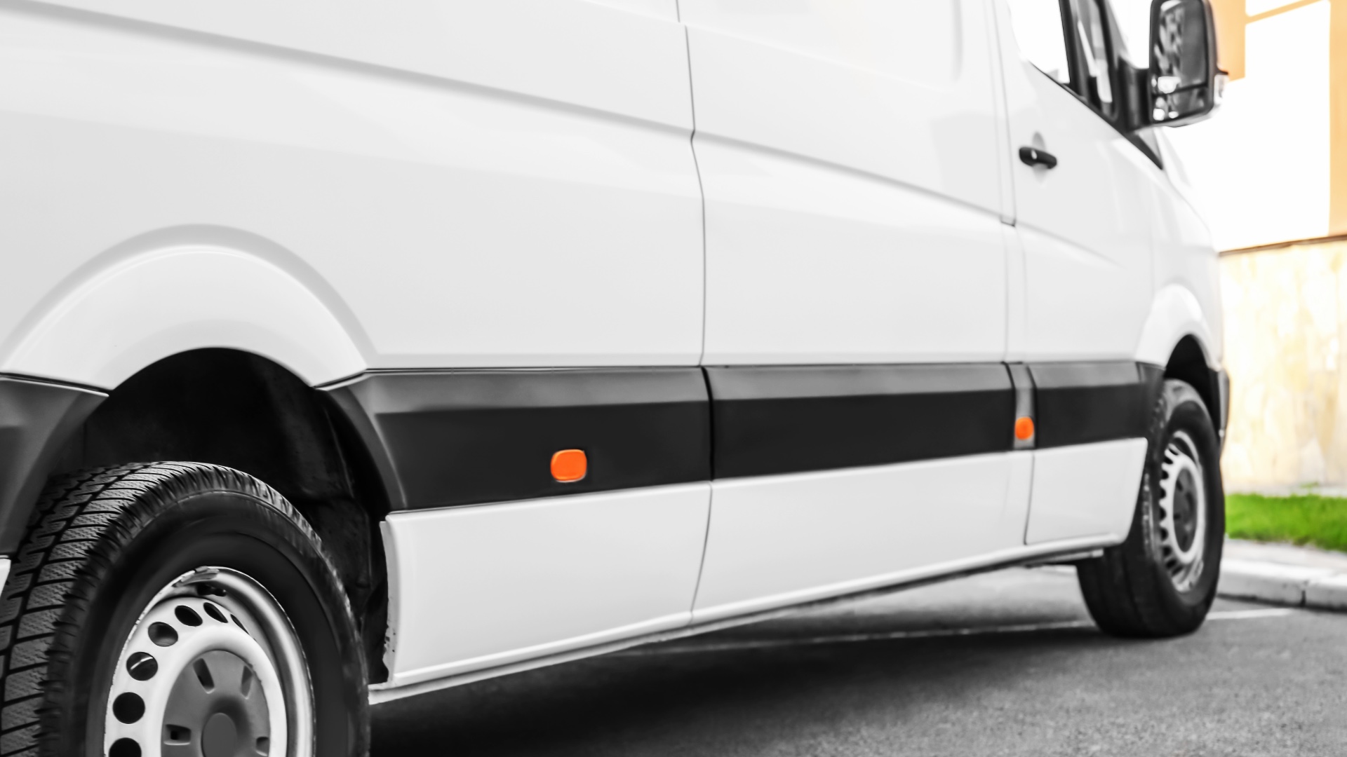 Business Vehicle Finance in Australia White commercial cargo van parked on asphalt